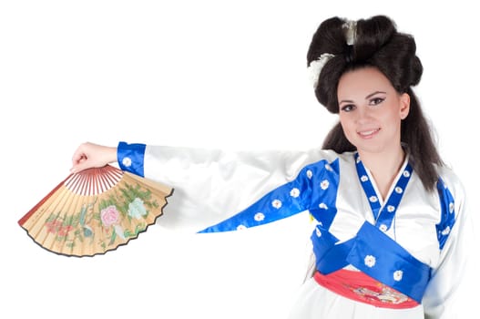 Portrait of the girl of the Asian appearance with a make-up under the geisha on a white background