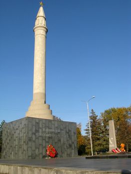 Monument; eternal flame; laid; architectral building; styles; park
