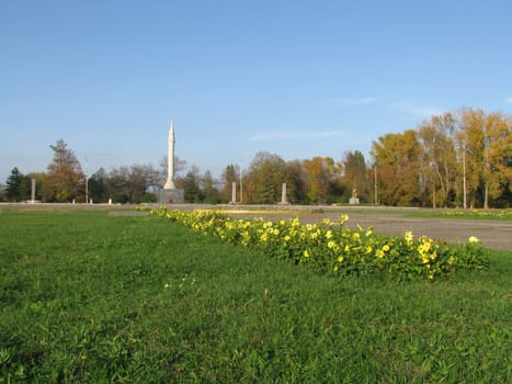 Monument; eternal flame; laid; architectral building; styles; park