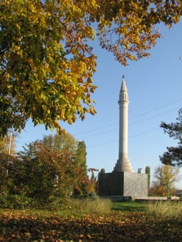 Monument; eternal flame; laid; architectral building; styles; park