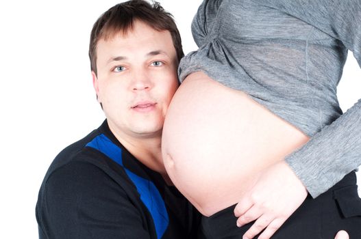 Shot of beautiful couple, pregnant woman isolated on white