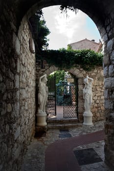 Old courtyard and walls in the village of Eze, France