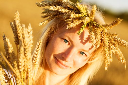 girl in field of wheat