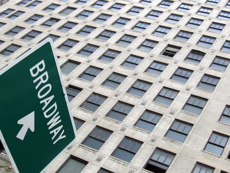 green street BROADWAY sign, building in background