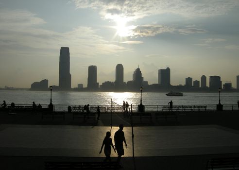 view from Manhattan, Jersey City building silhouettes in background