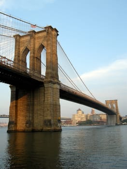 Brooklyn bridge in Manhattan, vertical photo, dusk