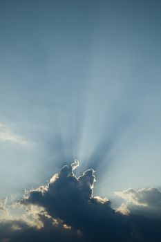 ray of light shining through a cloud, simple background