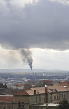 Flame and smoke of Feyzin refinery above Lyon city
