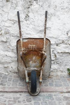 Old rusty barrow