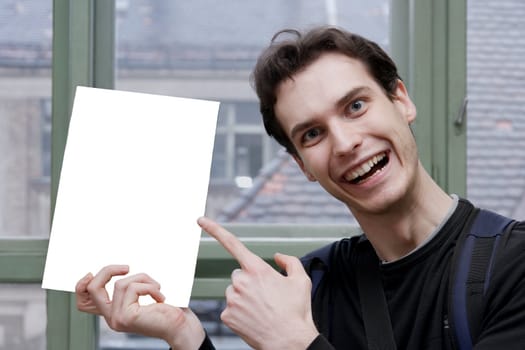 Student pointing at a sheet with white copyspace