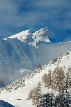 High mountains covered by snow in winter