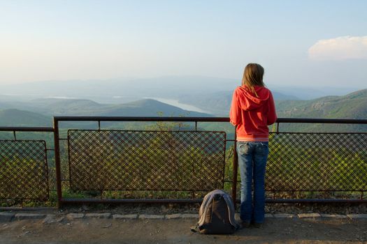 Girl enjoying the view on the landscape