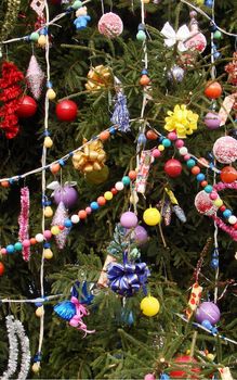 Decorated Fur -tree Christmas and New Year's background with balls