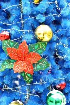 blue christmas background with balls and flower