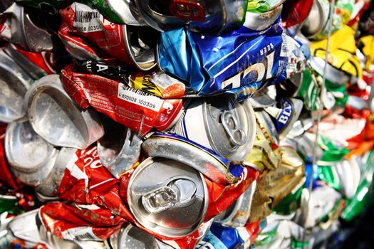 Compressed beer can background close up