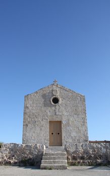 An old church with a crucifix in Malta