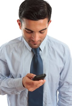 A businessman using a smart phone to make a phone call or sending or reading a text message SMS.  White background.