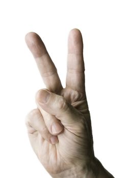 A hand with two fingers held up, showing the number two on white background