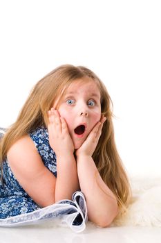 Excited girl making shocked face isolated on white