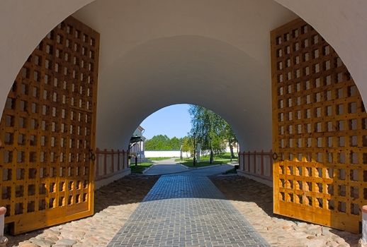 Gate with  arch in  monastery courtyard, Iversky Monastery, Russia.