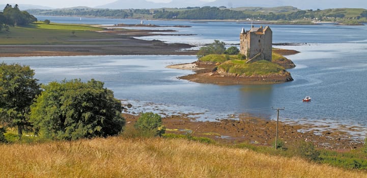 Castle Stalker is on an island on Loch linnhe, which is a sea loch in Argyll and Bute, Scotland.