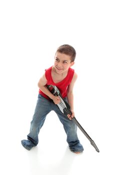 Little boy playing a guitar like a rock star.  White background.