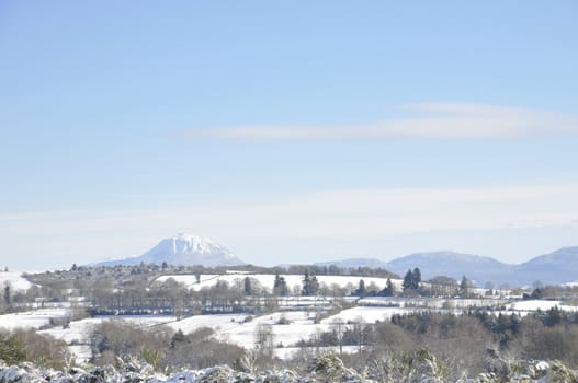 Winter landscape with "Puy-de-dome" mountain in "Auvergne" region in France