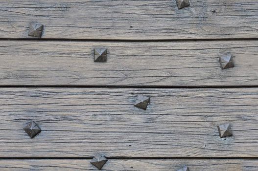 Wood planks with square nails texture that perfectly loop horizontally and vertically