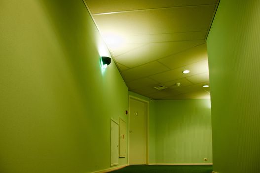 Modern and stylish neon green hotel corridor