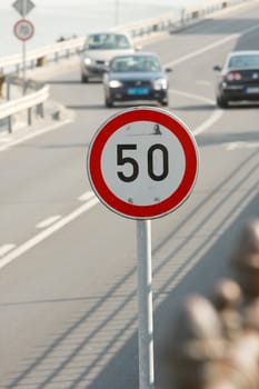 Speed limit sign on an urban road