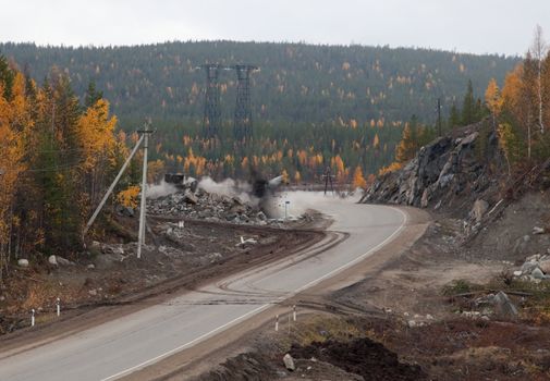 Blasting on the road to a forest