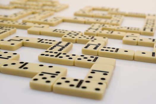 Domino bricks on white background