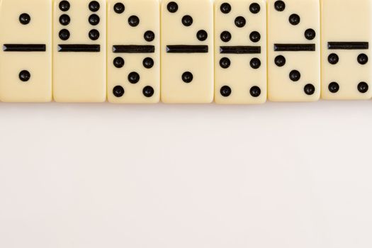 Domino bricks on white background