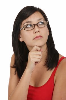 Beautiful dark haired woman with specs and thoughtful look