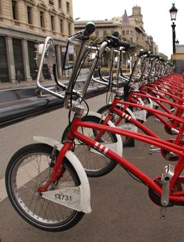 Public bicycles lined up in Barcelona center