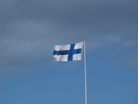 Flag of Finland against a blue sky