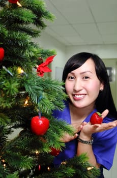 picture of a young lady on a christmas tree