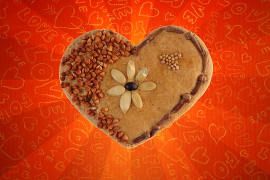 Lovely heart, made of bread, grits, seeds and clove.
Valentines and love concept.