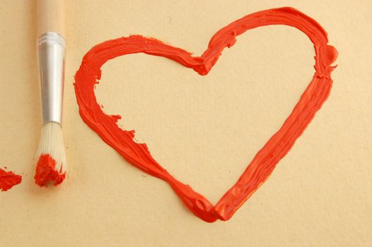 Painted red heart with brush. 
Valentines and love concept.