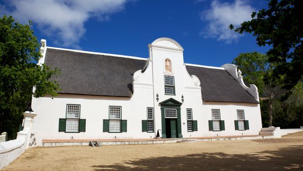 Groot Constantia, the finest surviving example of Cape Dutch architecture, and one of South Africa’s foremost historical monuments tourist attractions, dates back to 1685. Groot Constantia has been producing wine for more than three centuries. In 1685, Simon van der Stel, the later governor of the Cape, was granted land for a farm, which he named Constantia. When he died the property was divided and a smaller farm created around the homestead. The vineyards are tucked in a steep valley on the eastern side of Table Mountain. The name Constantia is irrevocably linked to the most famous wines to be made in South Africa.