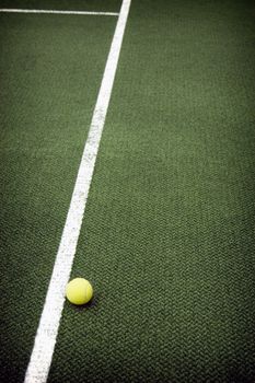 Tennis compositon. Yellow ball, lines and court.