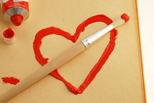 Painted red heart with brush. 
Valentines and love concept.