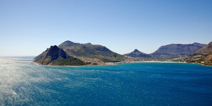 Hout Bay with The Sentinel guarding its entrance, Cape Peninsula, South Africa.