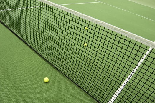 Tennis compositon. Yellow ball, lines and court.