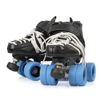 Photo of Roller Derby quad skates. Focus is on the front skate.
