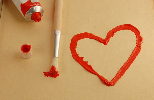 Painted red heart with brush. 
Valentines and love concept.