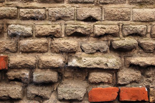 Old dirty brick wall.
Grungy background.