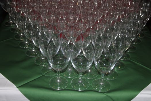 Wine glasses set out for a festive party.