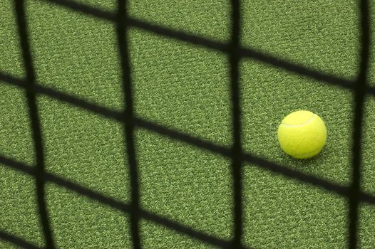 Tennis compositon. Yellow ball, lines and court.