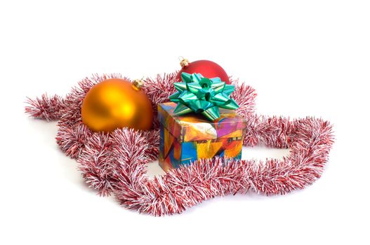 Gift boxes and Christmas ornaments on white background.